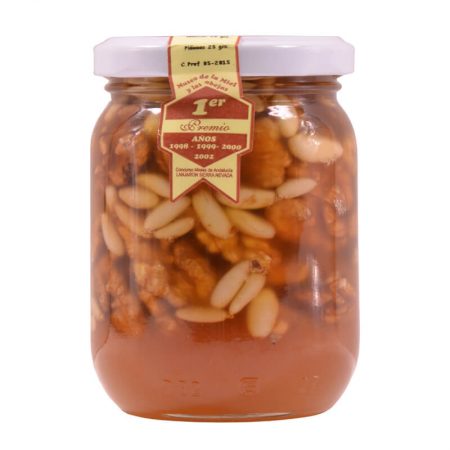 Raw honey jar with walnuts and pine nuts from the Rancho Cortesano