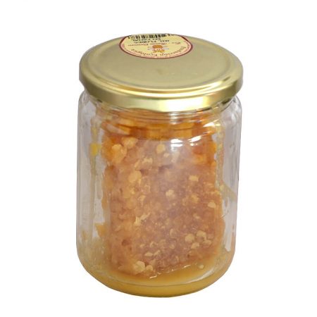 Honey in ecological honeycomb of thousand flowers